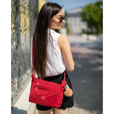 Angel sokzsebes női oldaltáska ajándék kulcstartóval