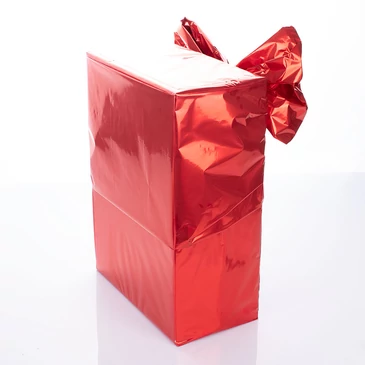 Ajándékcsomagolás piros nagy masnival