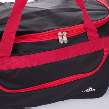 Tágas utazótáska méret fekete-piros színben