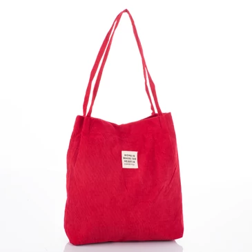 Női válltáska kordbársony anyagból piros színben