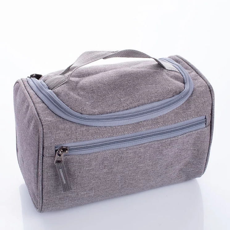 Kozmetikai táska szürke színben