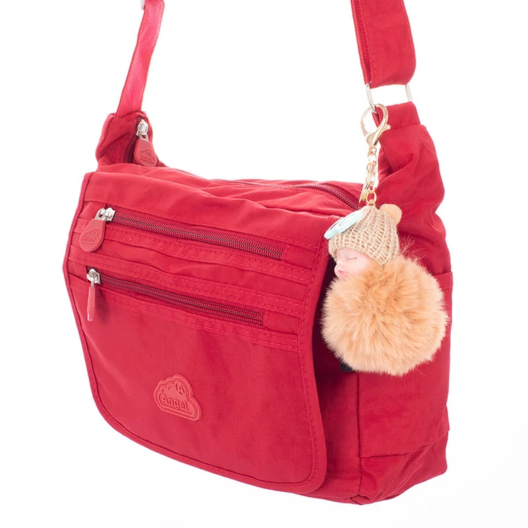 Angel sokzsebes női oldaltáska ajándék kulcstartóval