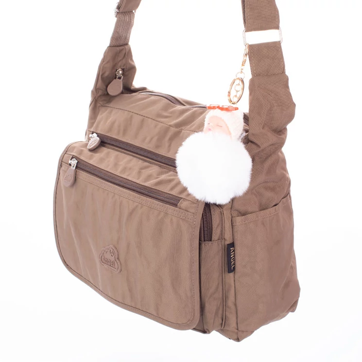 Angel sokzsebes női oldaltáska ajándék kulcstartóval