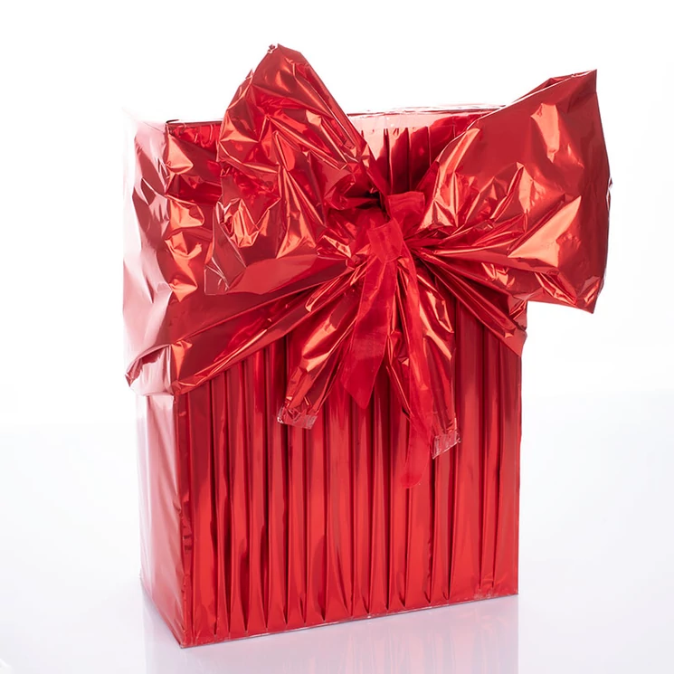 Ajándékcsomagolás piros nagy masnival