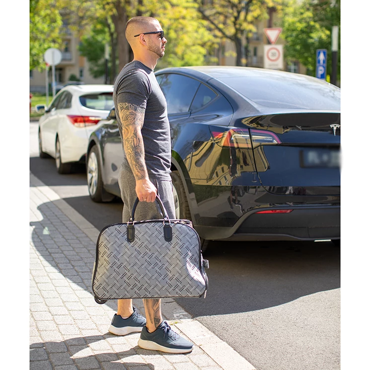 Többzsebes gurulós utazó táska