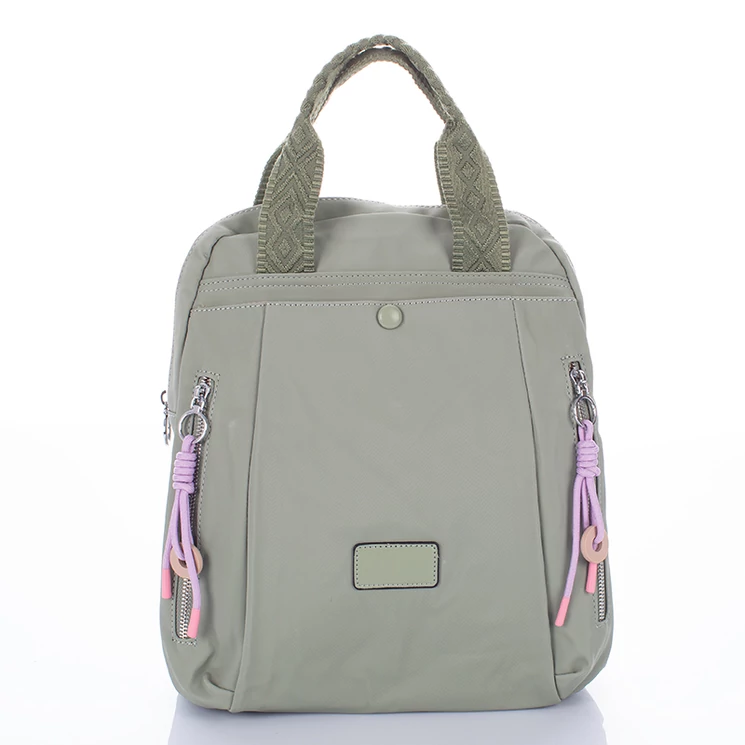 Sokzsebes vízálló női hátizsák pisztácia színben