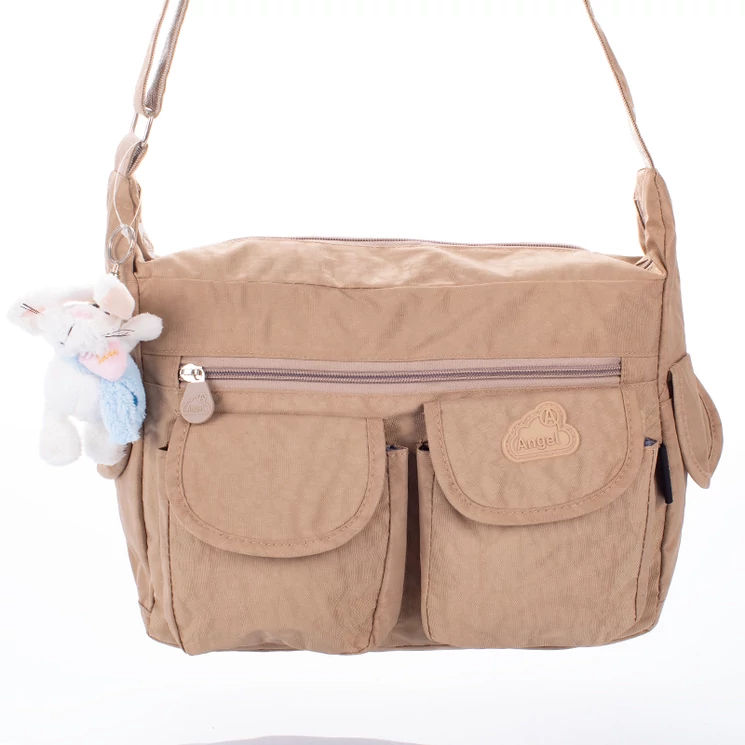 Angel sokzsebes női oldaltáska bézs színben ajándék kulcstartóval