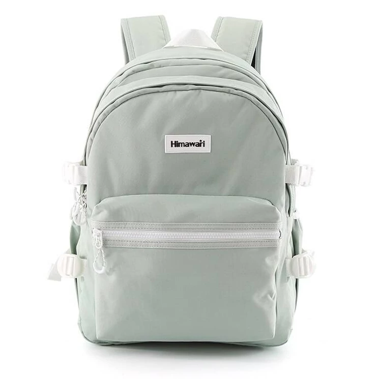 Városi, tágas hátizsák vízálló anyagból Mentazöld színben