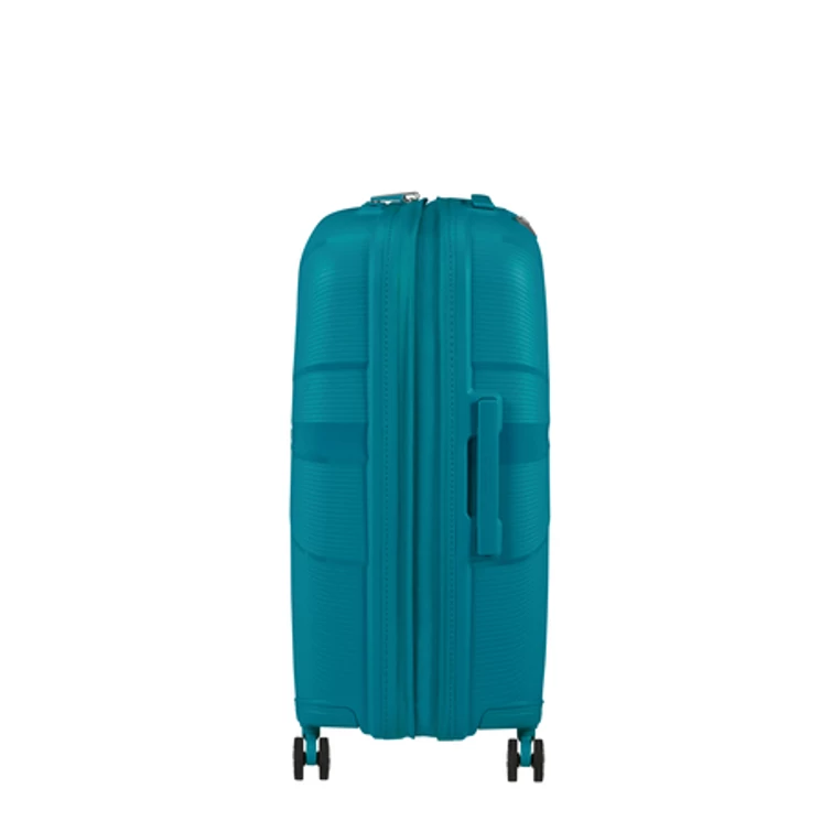 American Tourister Starvibe Spinner Bővíthető Bőrönd 67cm Világoskék 3 év garancia