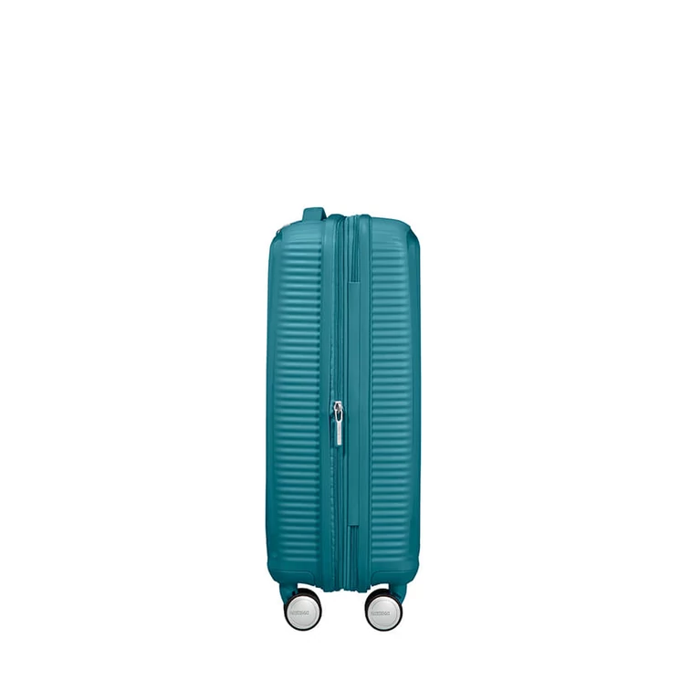 American Tourister Soundbox bővíthető Spinner bőrönd 55 fűzöld színben