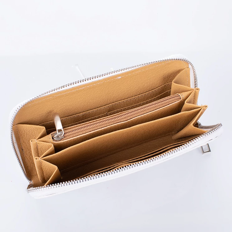 Valódi bőr ezüst színű körbezippes női pénztárca