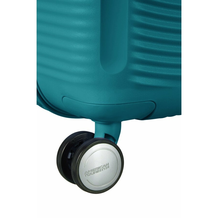 American Tourister Soundbox bővíthető Spinner bőrönd 55 fűzöld színben